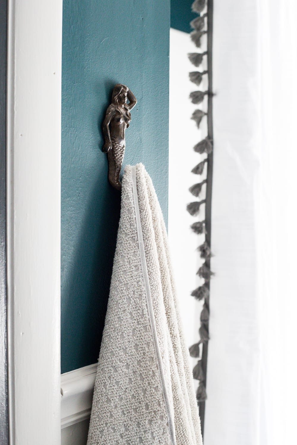 kid-friendly home - hooks for hanging up towels easily in the bathroom
