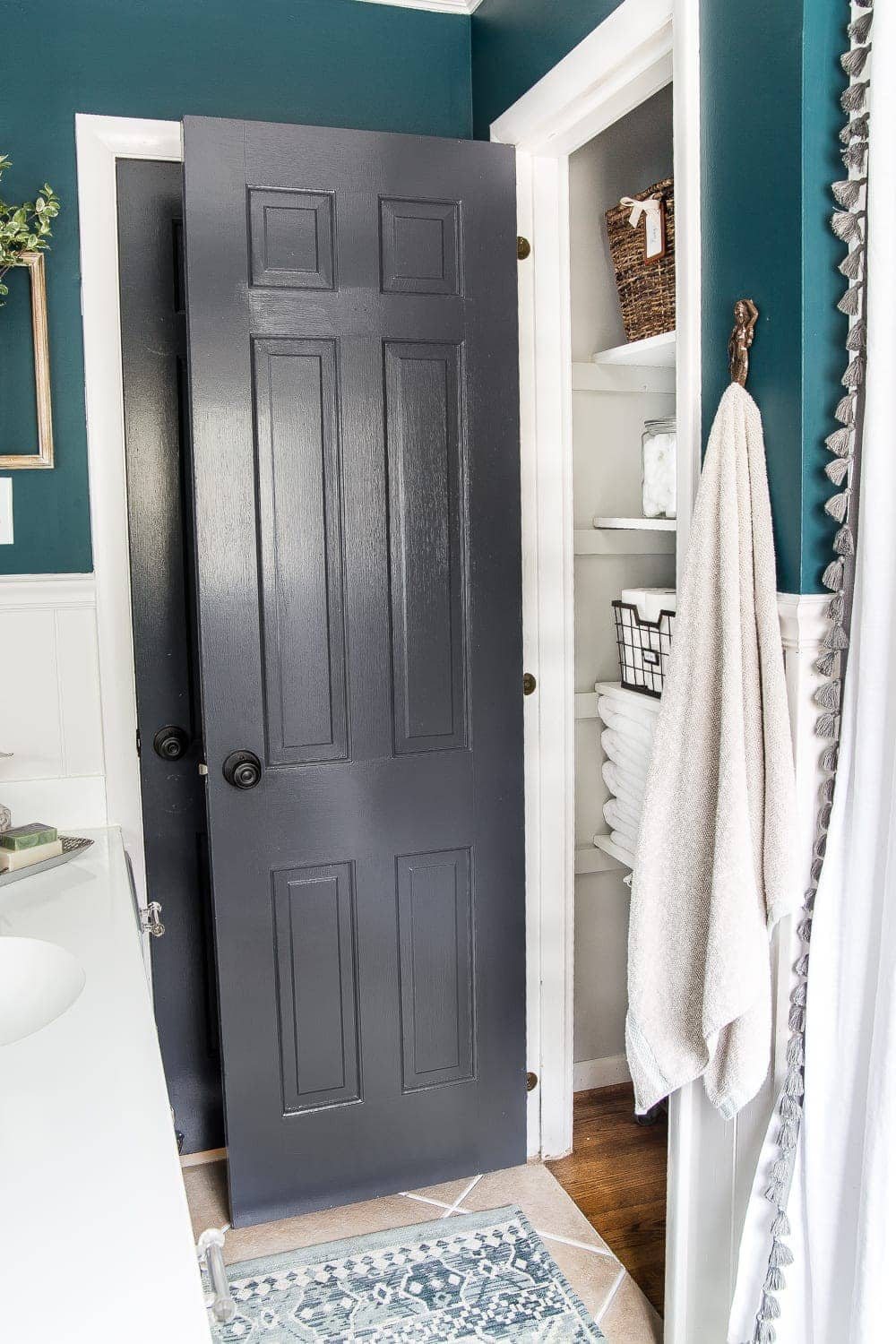 kid-friendly home - black doors for hiding dirty hand prints