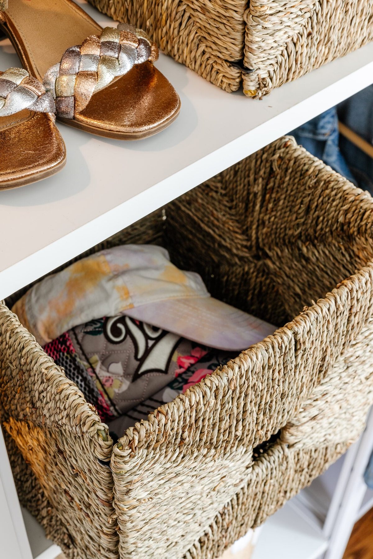 baskets to store hats and clothing accessories in a girls closet