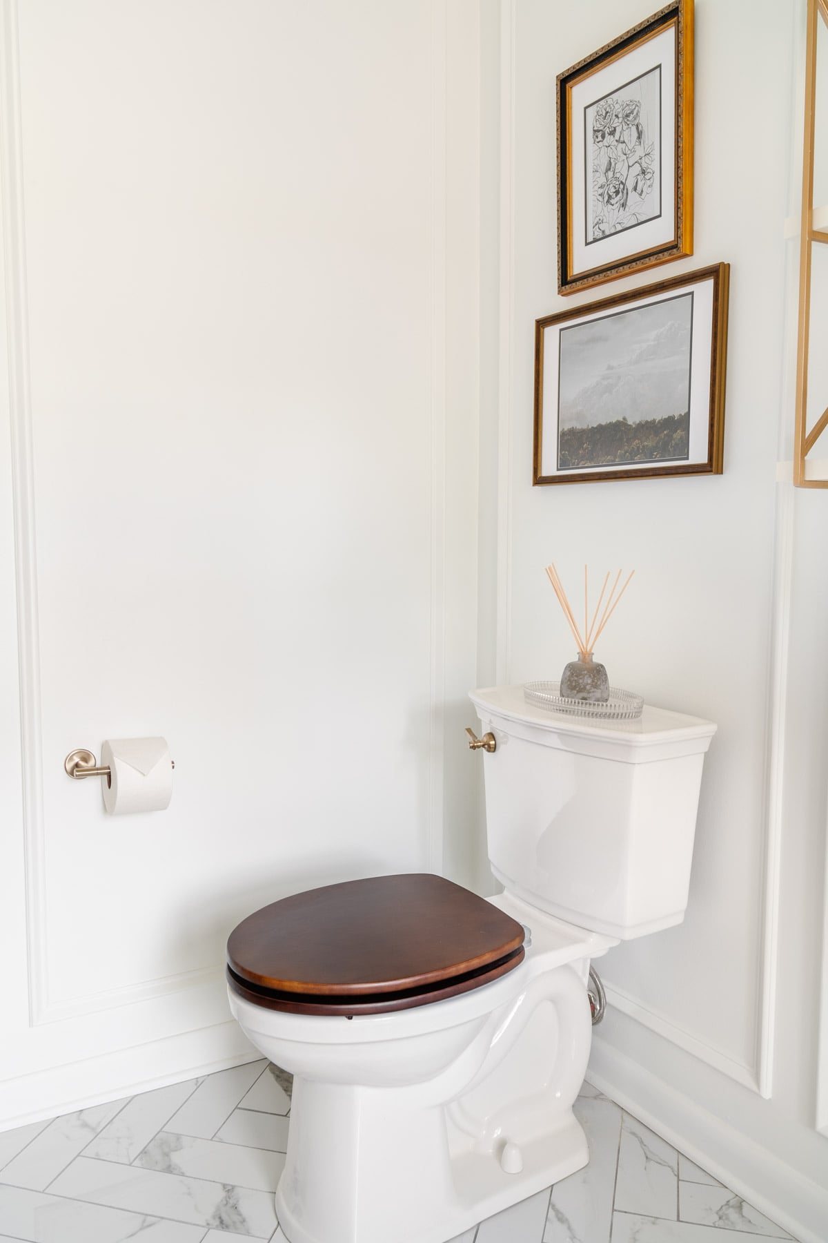 relaxing bathroom art and wooden toilet seat