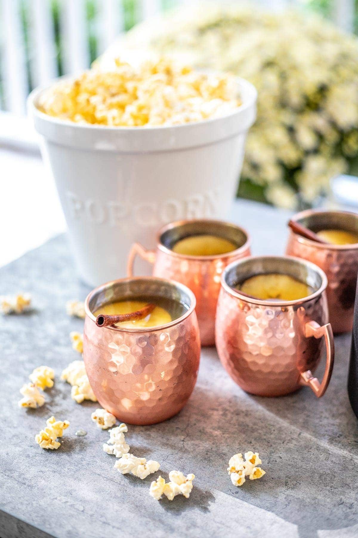 bonfire party food serving popcorn and apple cider