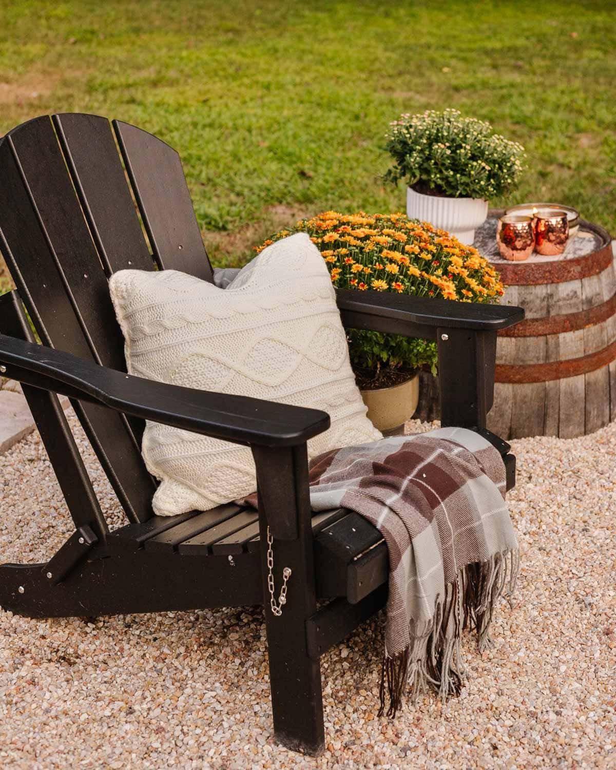 outdoor fall decor - cable knit pillows with plaid blankets