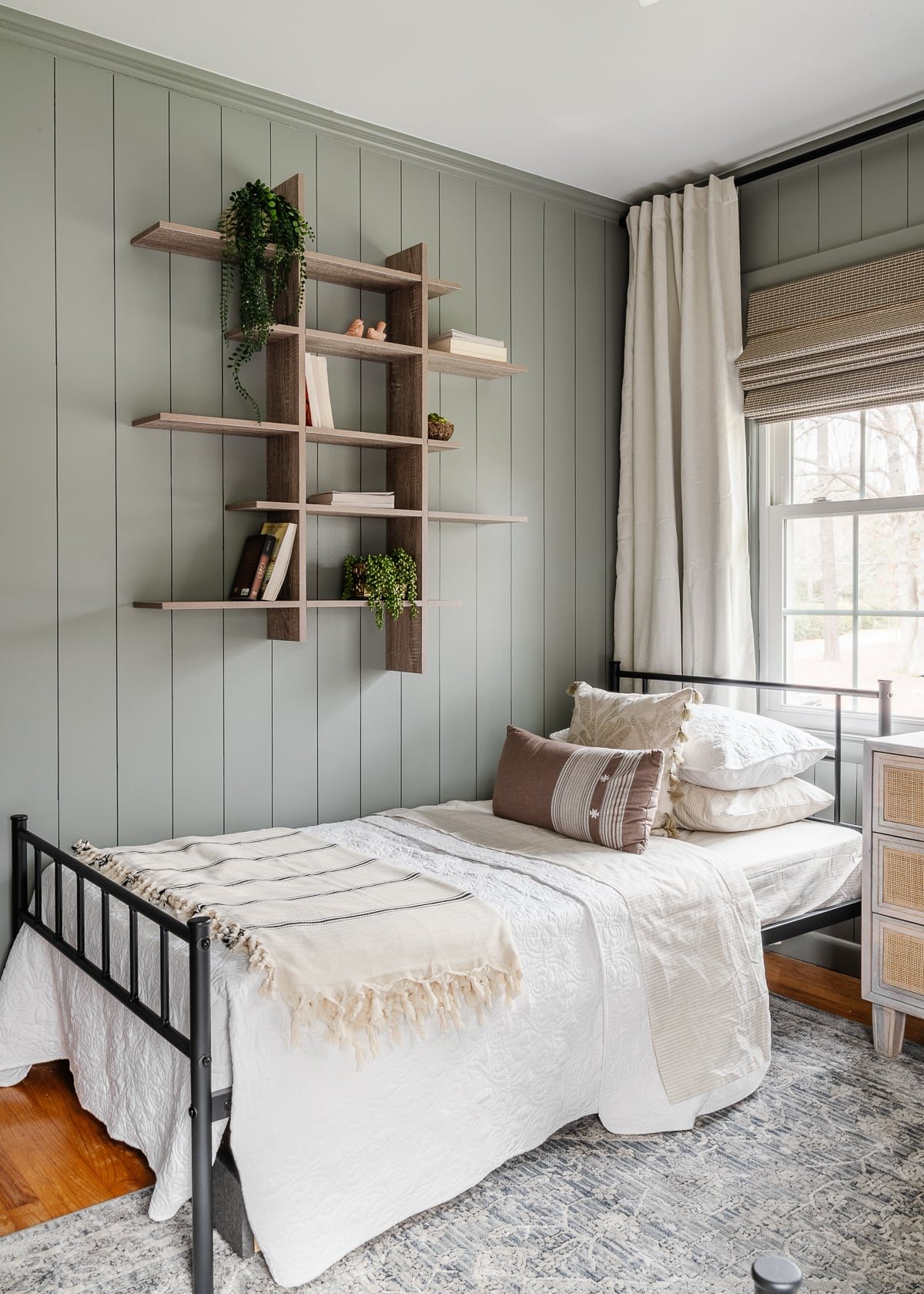 modern shelf in a teen girl bedroom to store bedside books