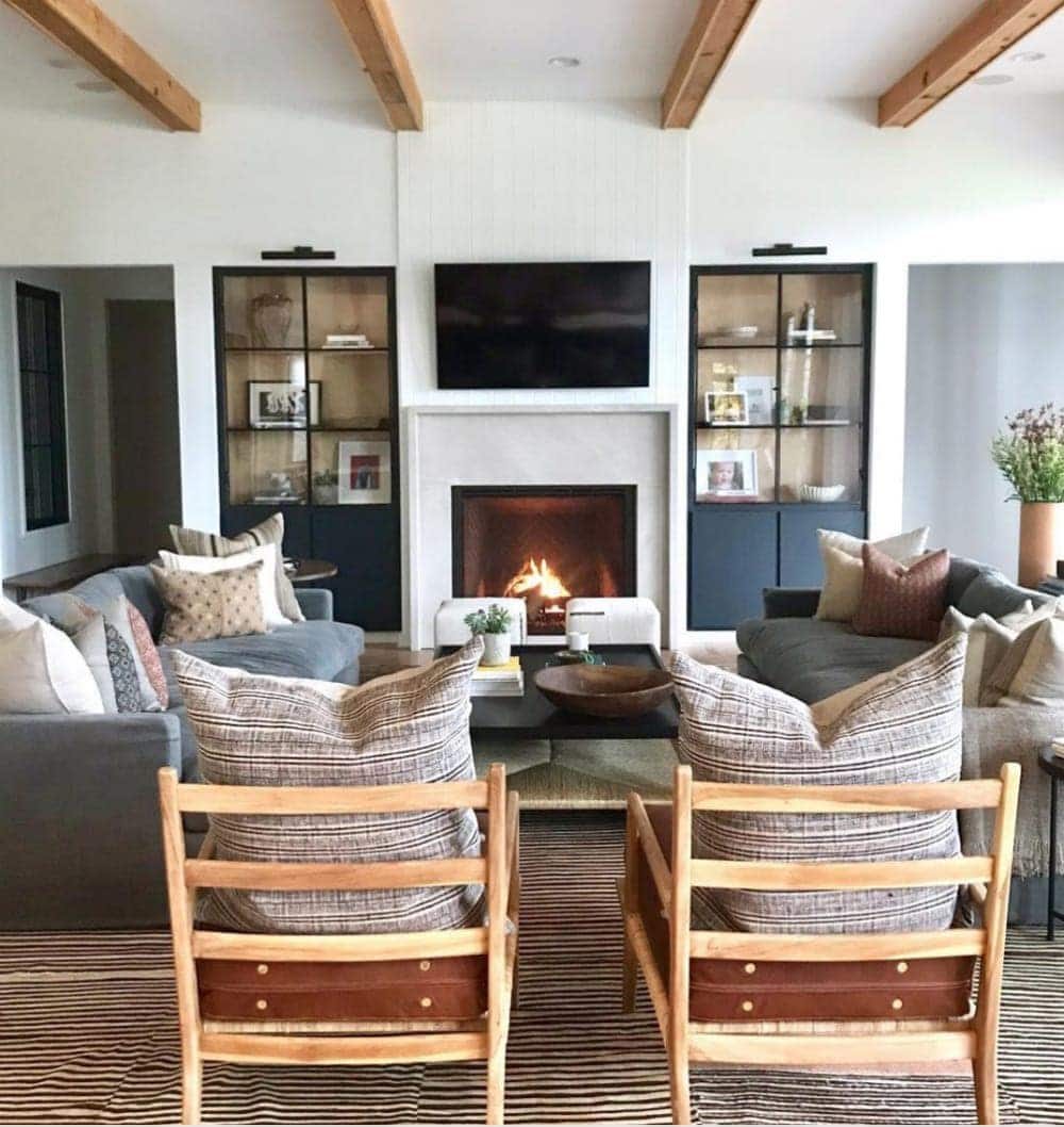 Flank your TV with cabinets to give it balance.