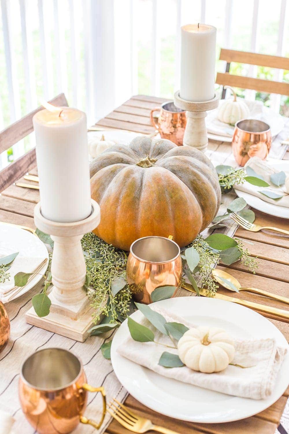 Fall Back Porch | How to style your outdoor spaces for autumn using capsule decor items that will last throughout the seasons and get the most bang for your buck.