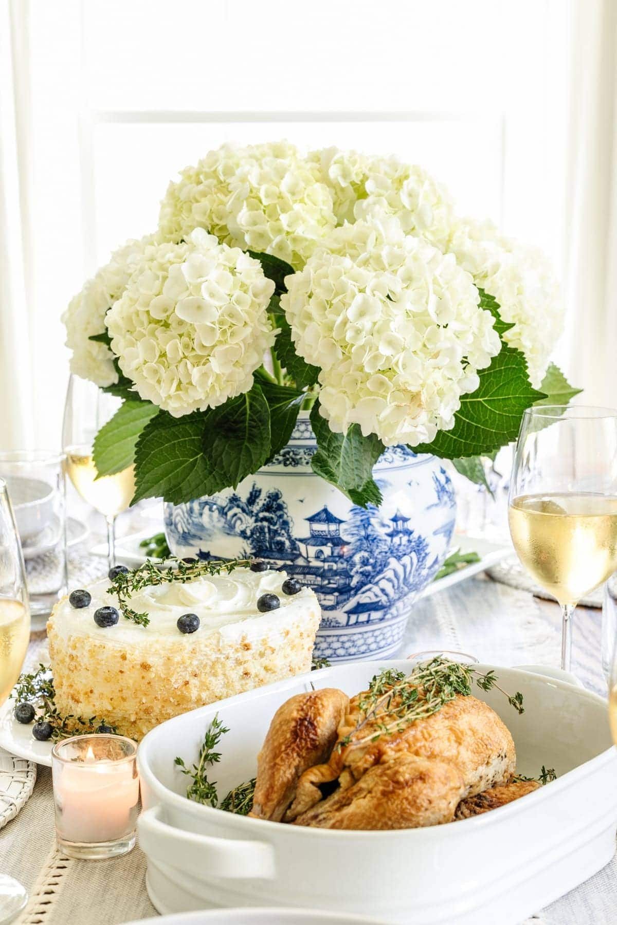blue chinoiserie vase of hydrangeas for summer centerpiece
