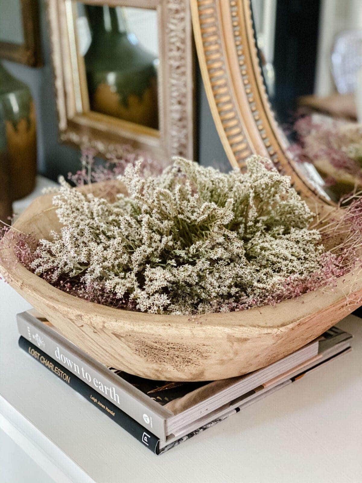 wooden bowl of dried flowers for natural decor display