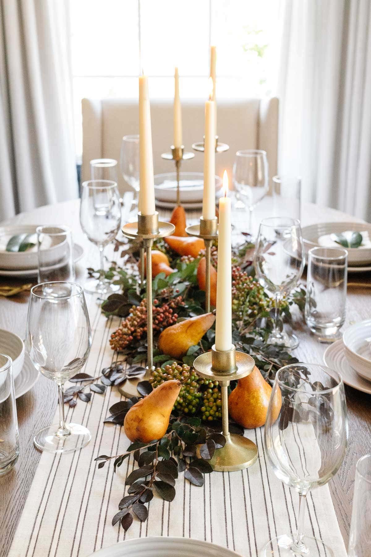 Thanksgiving centerpiece - fresh cut leaves, pears, and candles