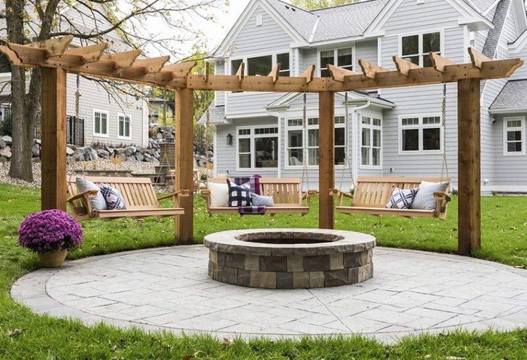fire pit with swings and pergola