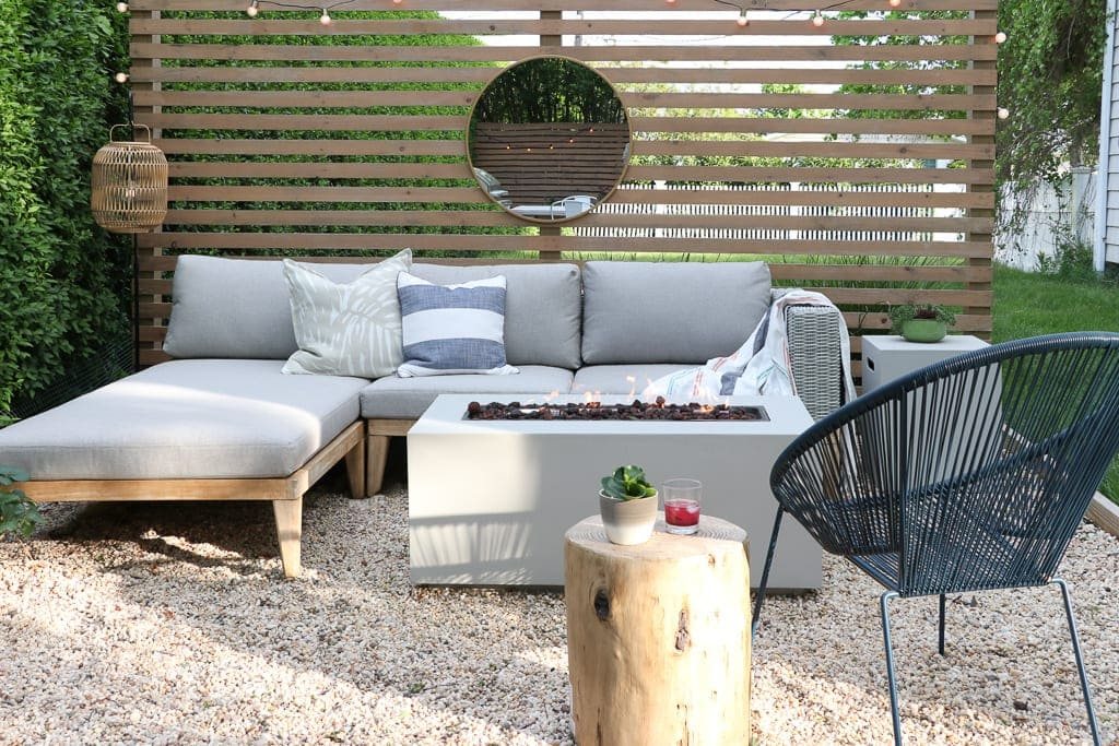 fire pit with sectional and wood screen