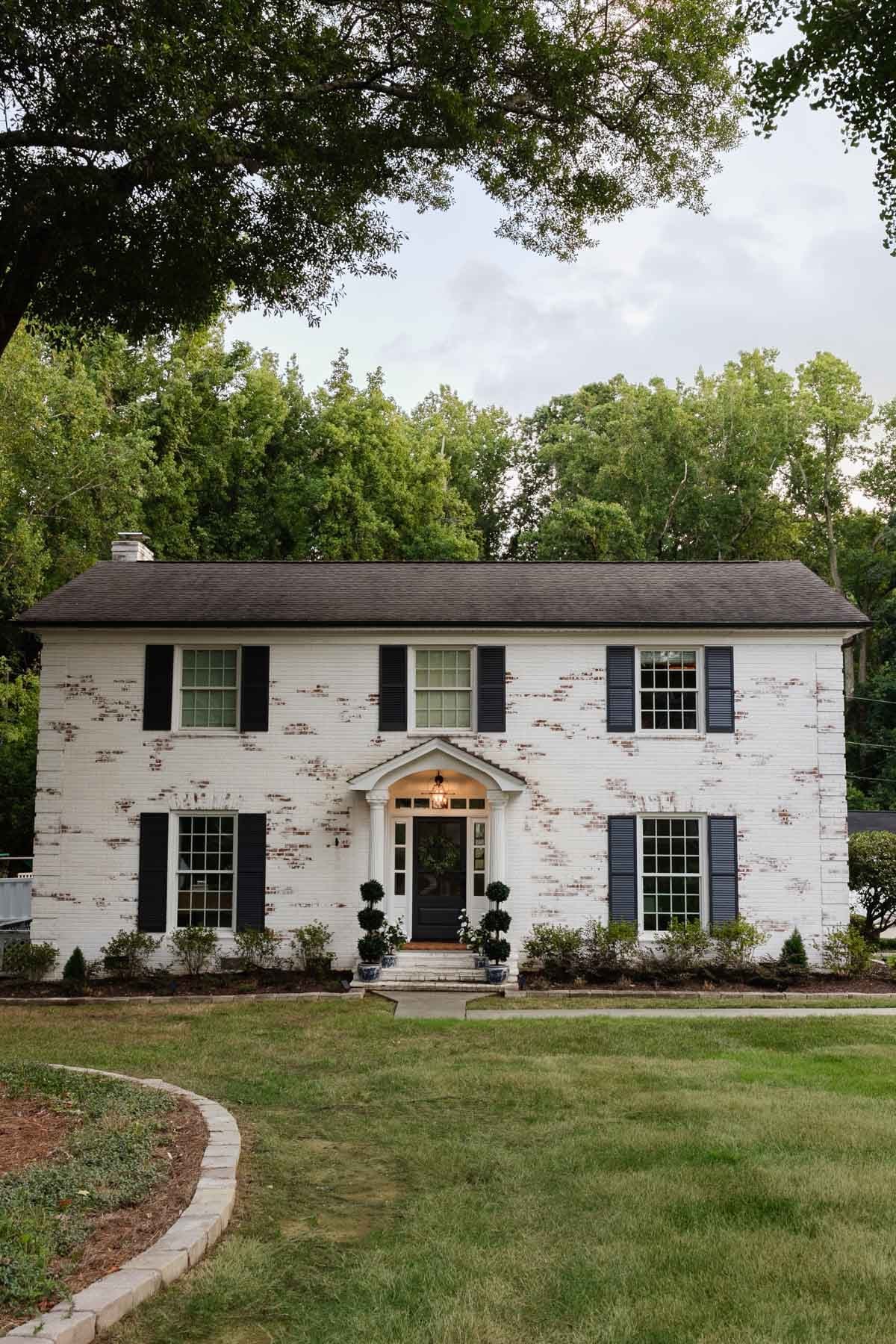 colonial limewash brick house exterior