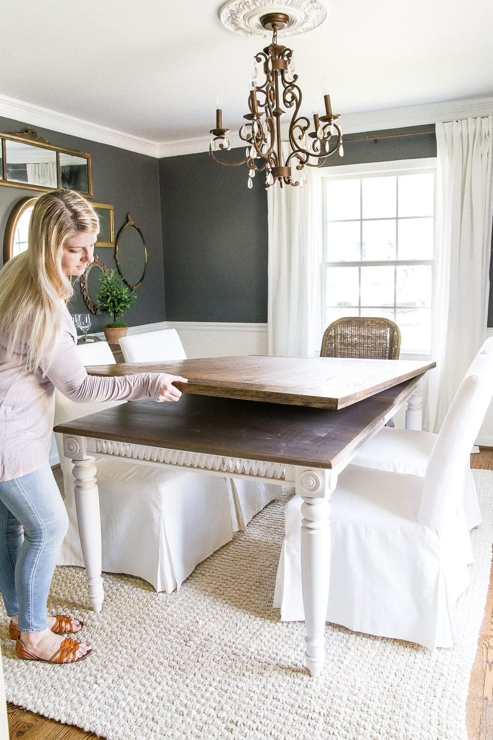 A tutorial for how to build a retrofitted table top to fit over any existing table using Minwax Dark Walnut stain. #build #furniturebuilding #tabletop #diningtable #diytable #farmhousetable #diyfurniture #woodworking #furnituremakeover #tablemakeover #minwax #woodstain #walnut