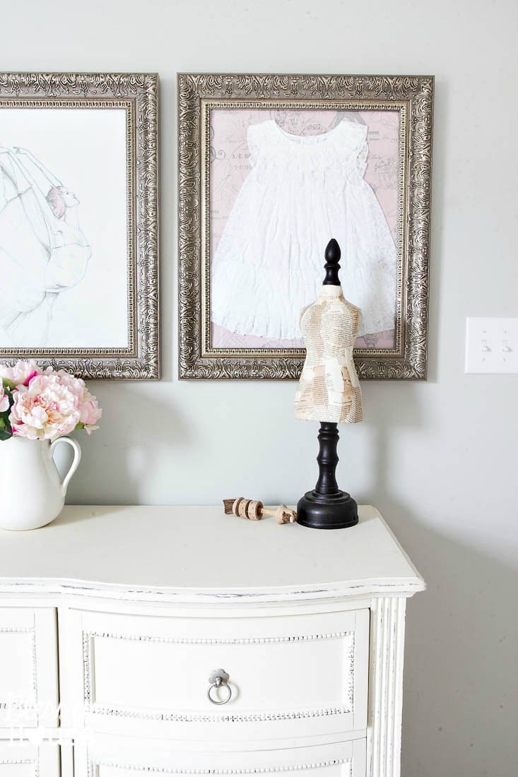 framing baby clothes as DIY wall decor ideas in a nursery