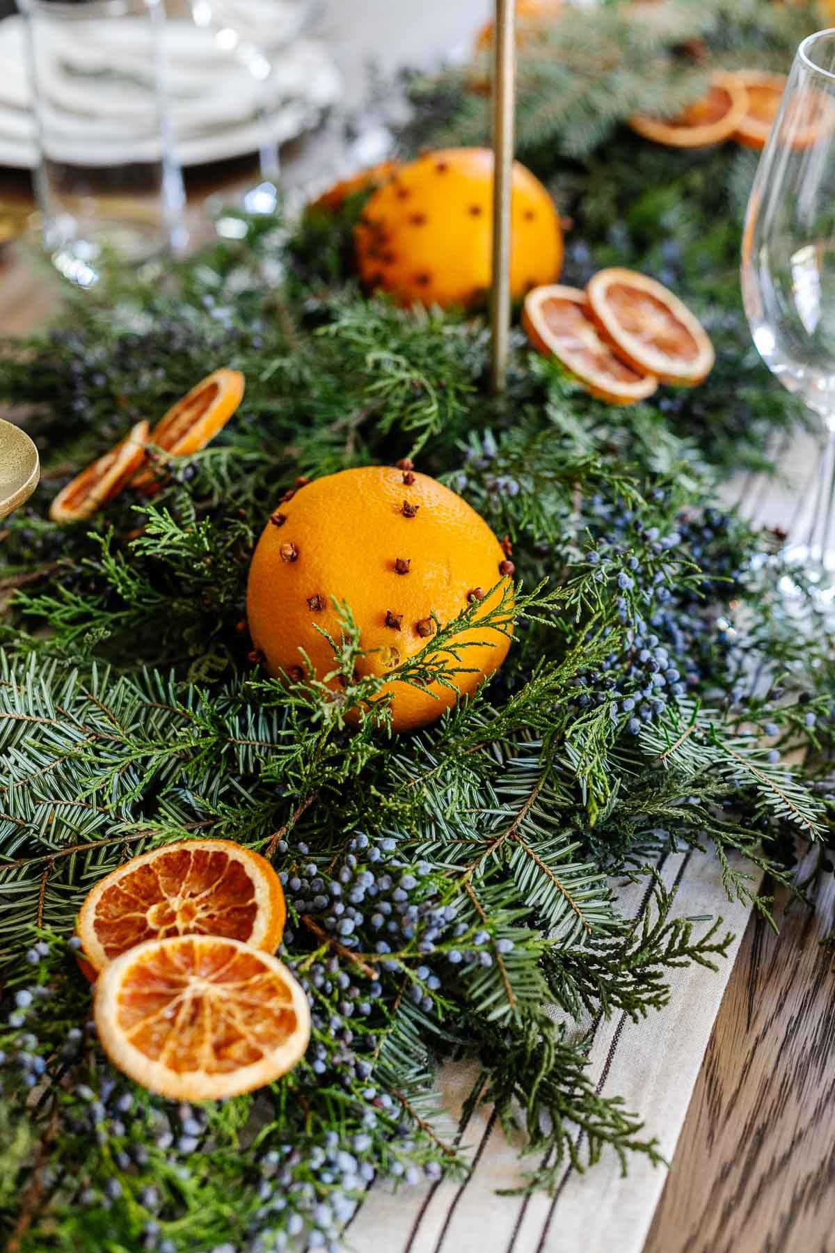 juniper, orange, and evergreen Christmas greenery