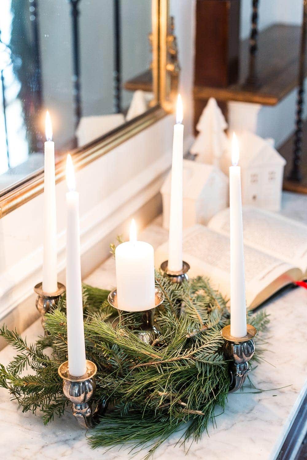 Classic Christmas Foyer | unigumushane.com - A classic traditional entryway / foyer decorated for Christmas using fresh pine and holly greenery and a St. Lucia Day Advent wreath. #christmasfoyer #classicdecor #traditionalchristmas