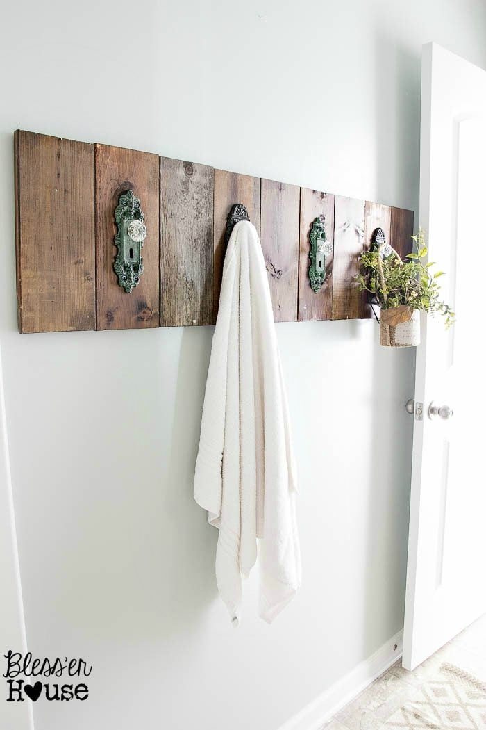 towel hooks made from old wood scraps and door knobs