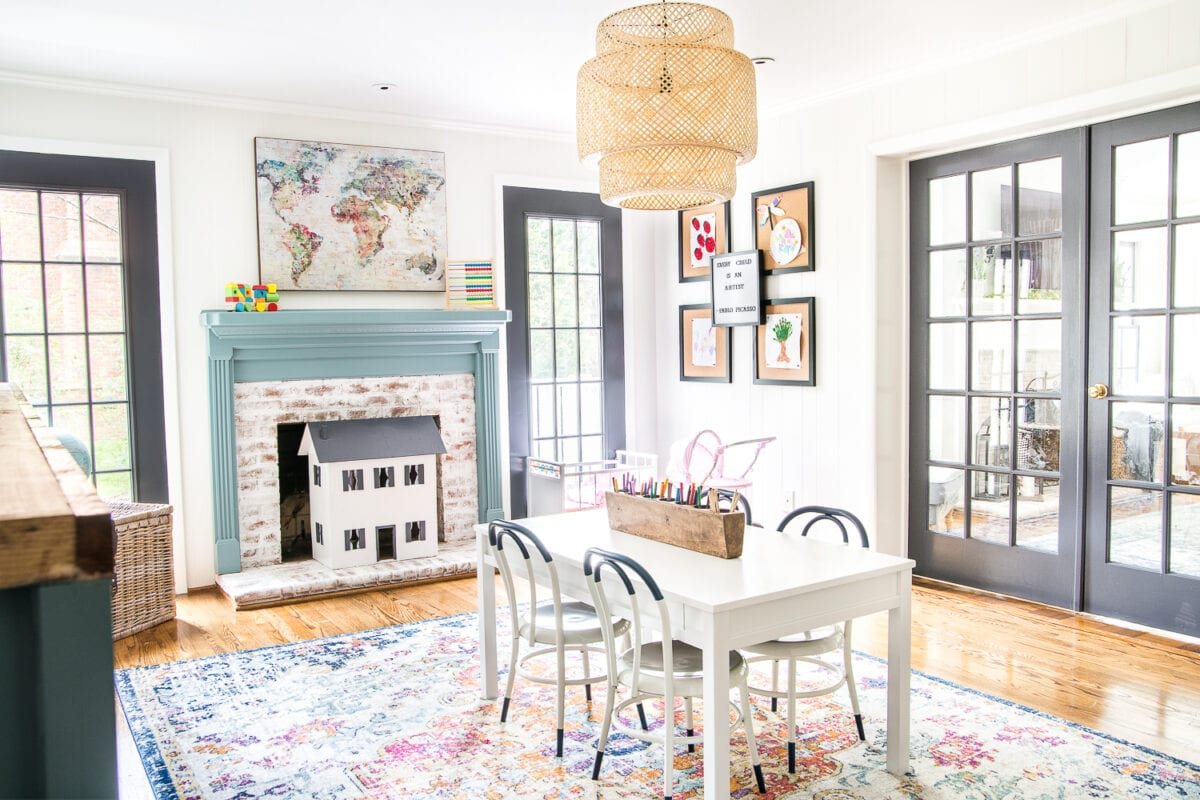 A dated, unorganized playroom gets a bright and whimsical makeover with organizational strategies, ideas for adding function, and DIY-able projects to create the perfect kid's space on a budget. #kidsroom #playroom #kidsdecor #toyorganizing