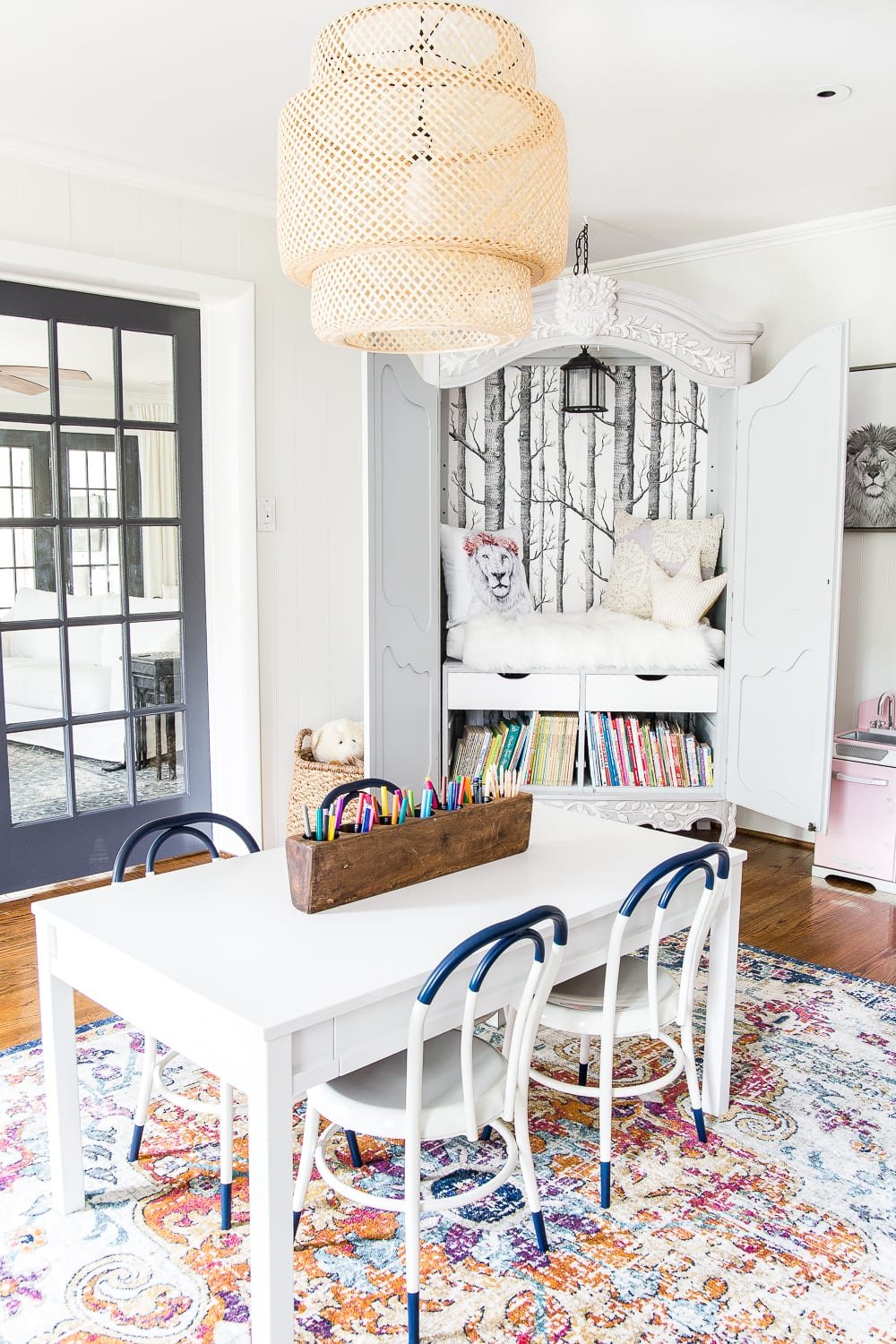 A dated, unorganized playroom gets a bright and whimsical makeover with organizational strategies, ideas for adding function, and DIY-able projects to create the perfect kid's space on a budget. #kidsroom #playroom #kidsdecor #toyorganizing