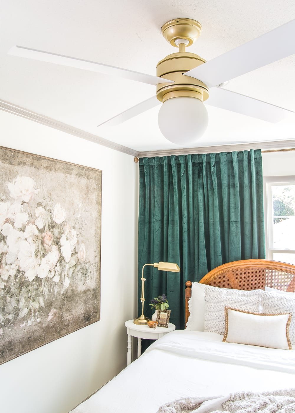 Gorgeous matte brass modern ceiling fan in a bedroom