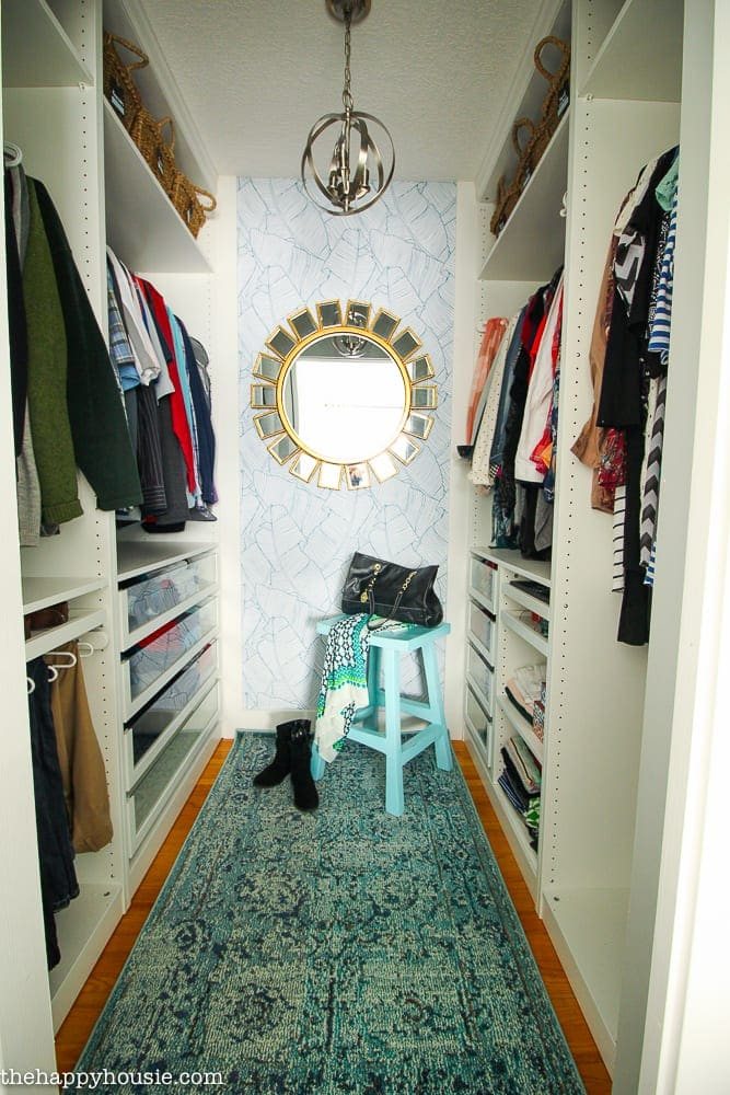 IKEA PAX Closet with rug and wallpaper focal wall