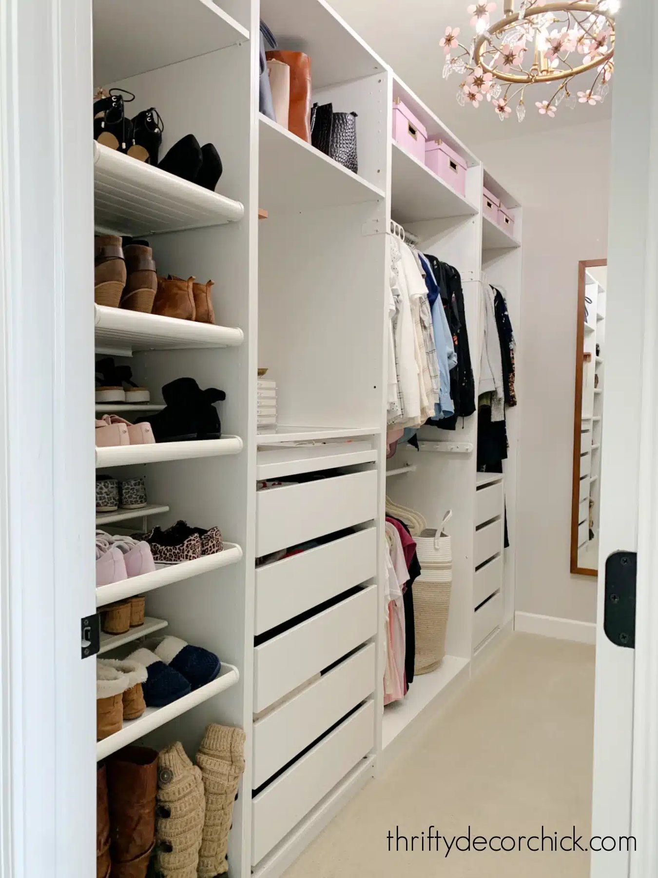 flower light fixture in a simple white closet