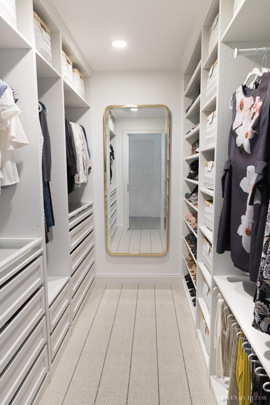 full length mirror in a master closet with IKEA shelves and drawers