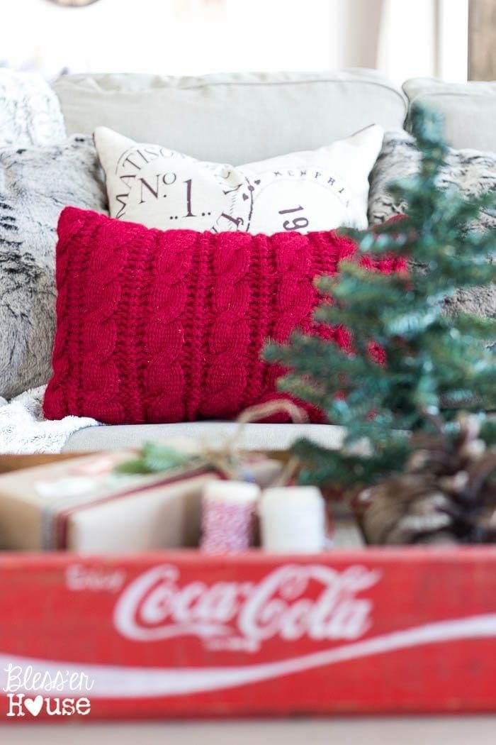 old sweater repurposed into a homemade pillow