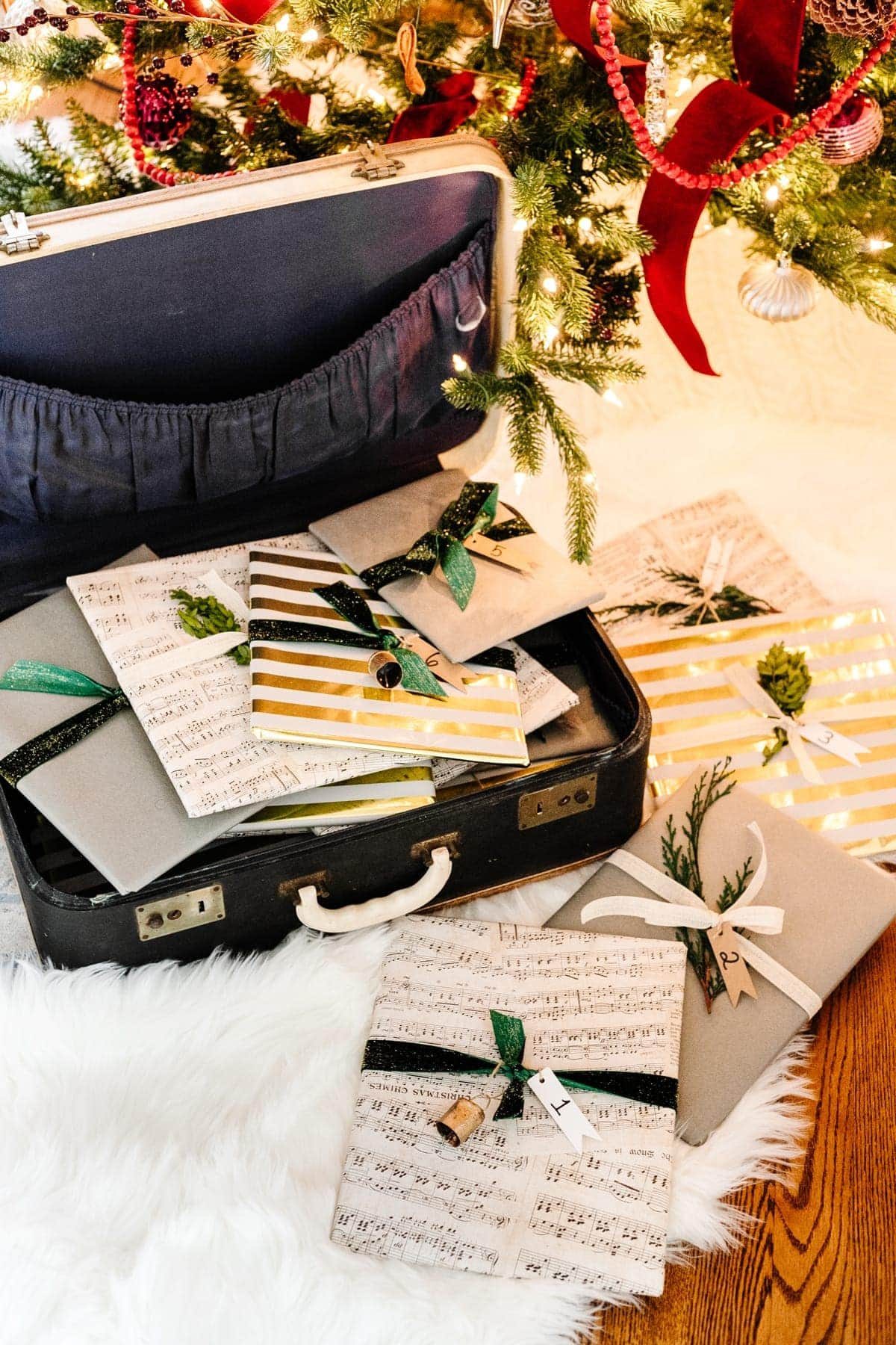 DIY advent calendar with storybooks in an old suitcase
