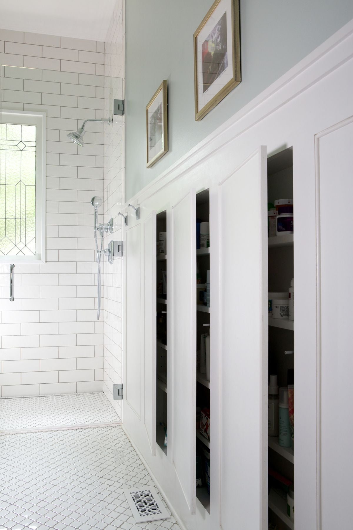 Hidden cabinets between studs in wainscoting