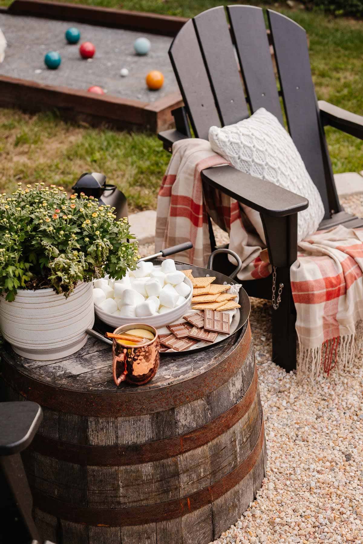 upside down planter used as an outdoor side table