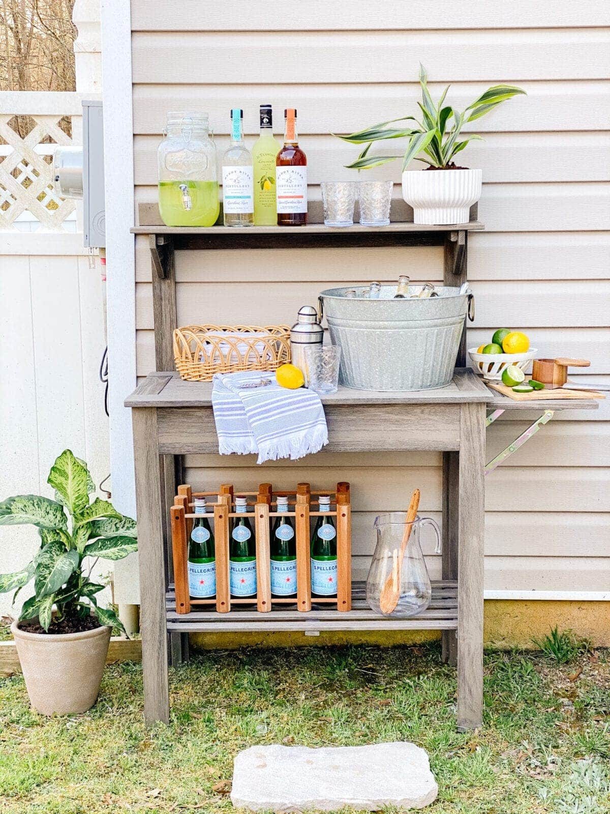 using a potting bench as an outdoor bar