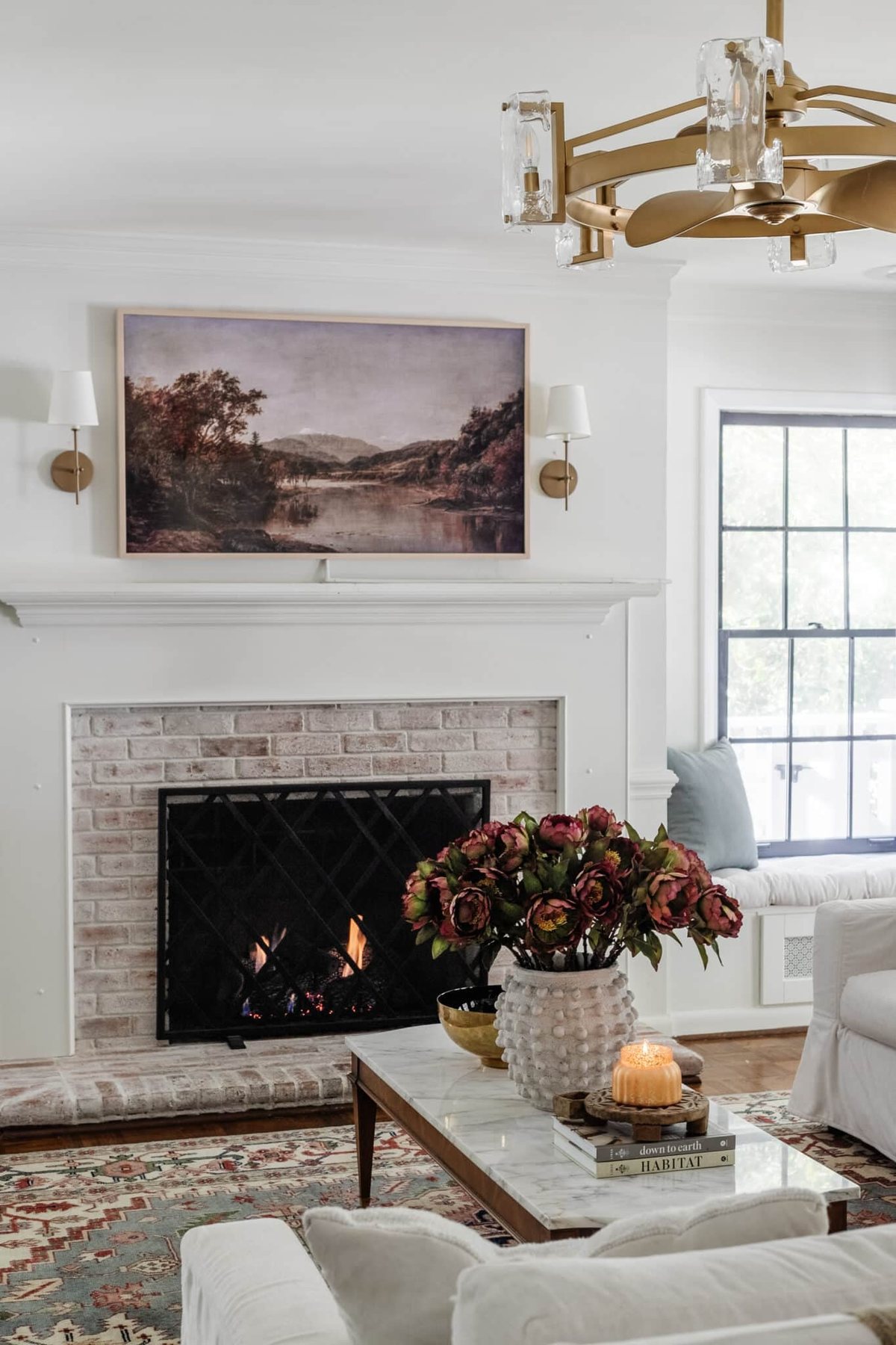 fall art on samsung frame tv above fireplace
