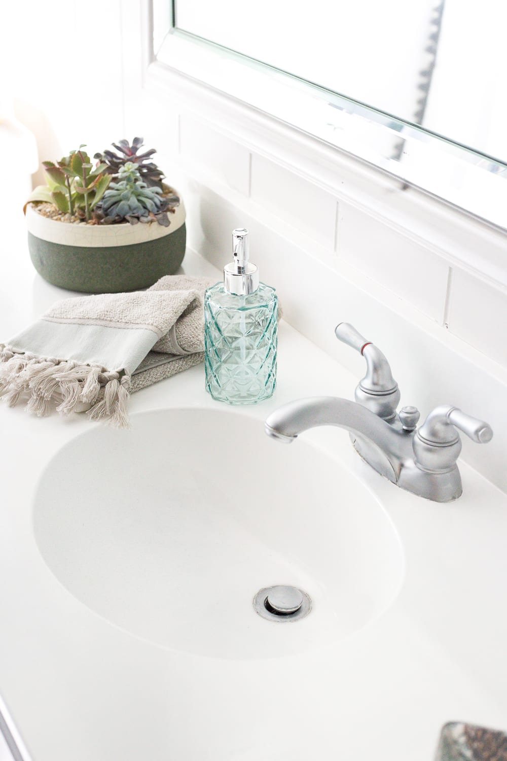 white painted bathroom sink countertop