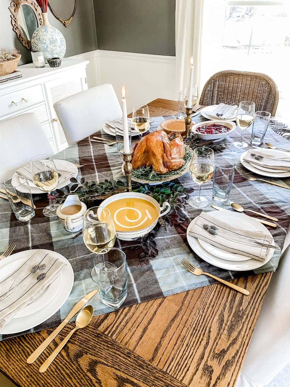 Use a throw blanket as Thanksgiving table decor