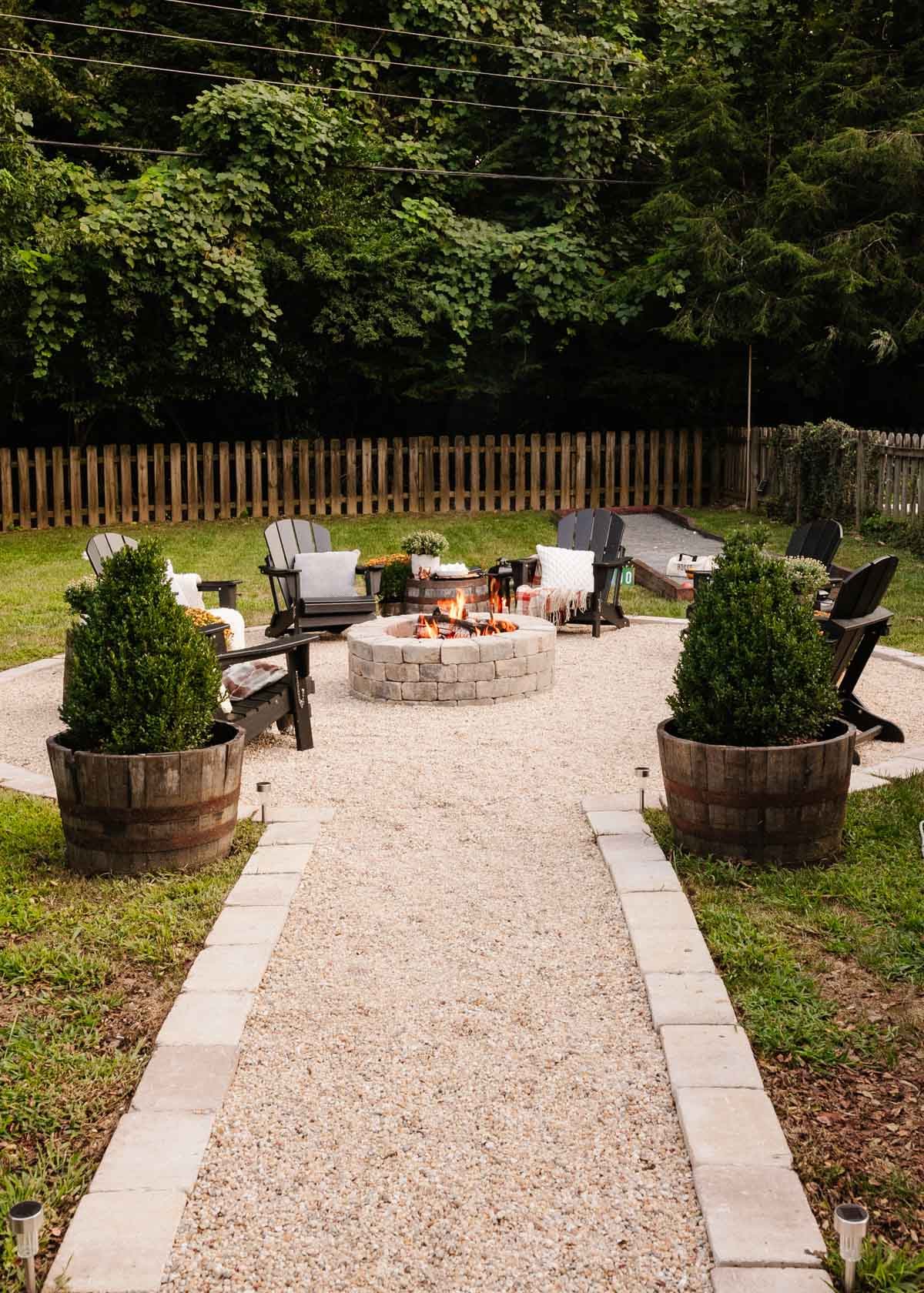 backyard fire pit decorated for fall