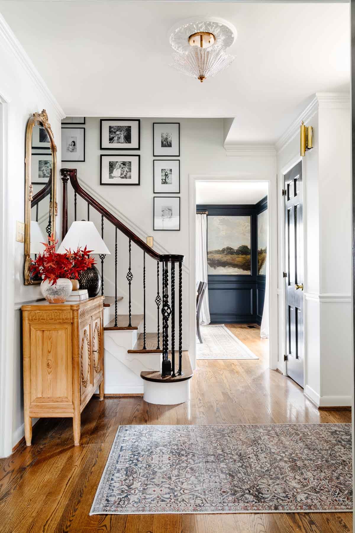 foyer ideas : gallery wall, entryway table, and rug