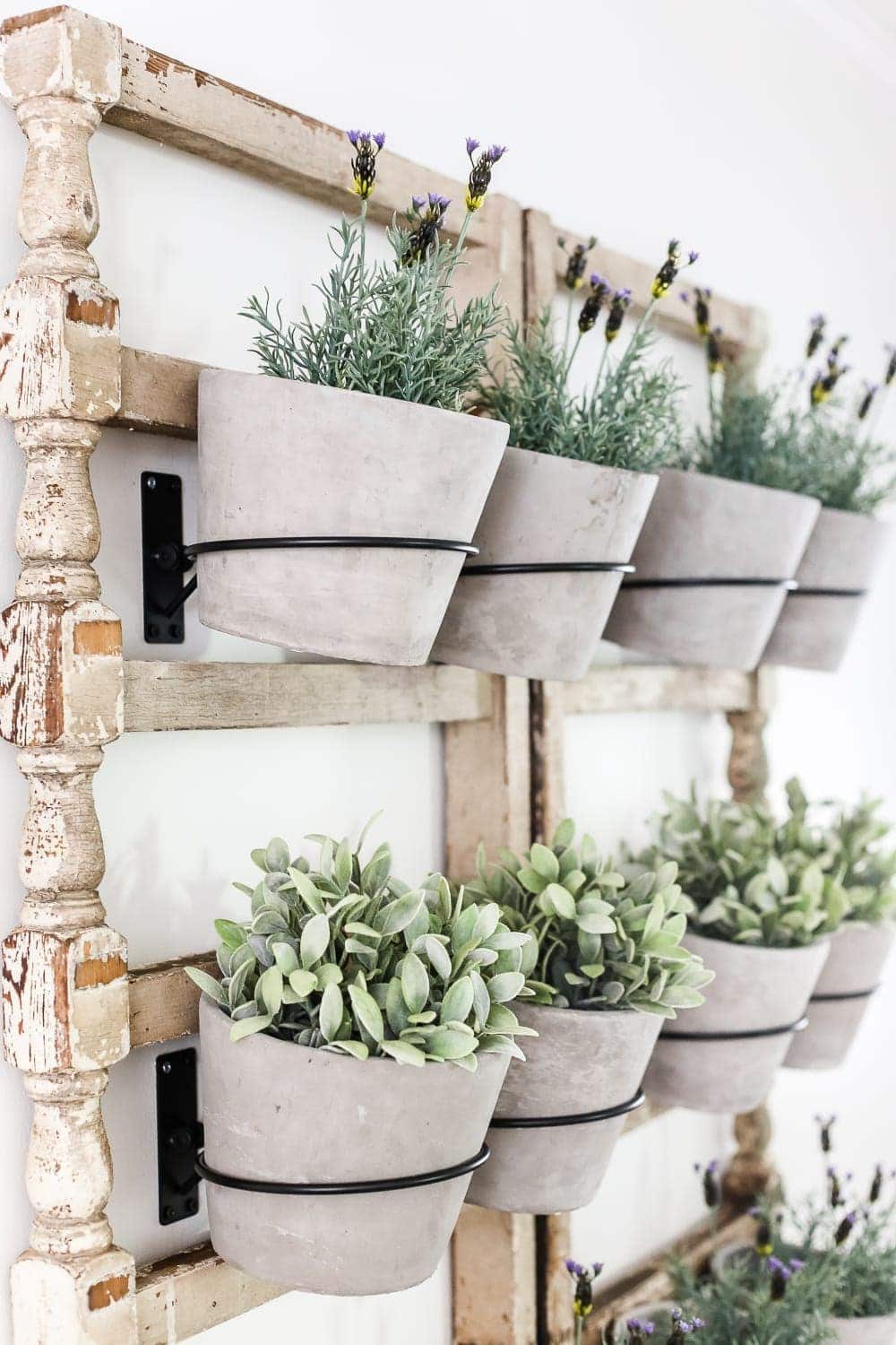 DIY Antique Banister Wall Planter | www.unigumushane.com - A quick and simple tutorial for how to make a wall planter from a repurposed antique banister using artificial plants. Cute way to bring the outdoors in!