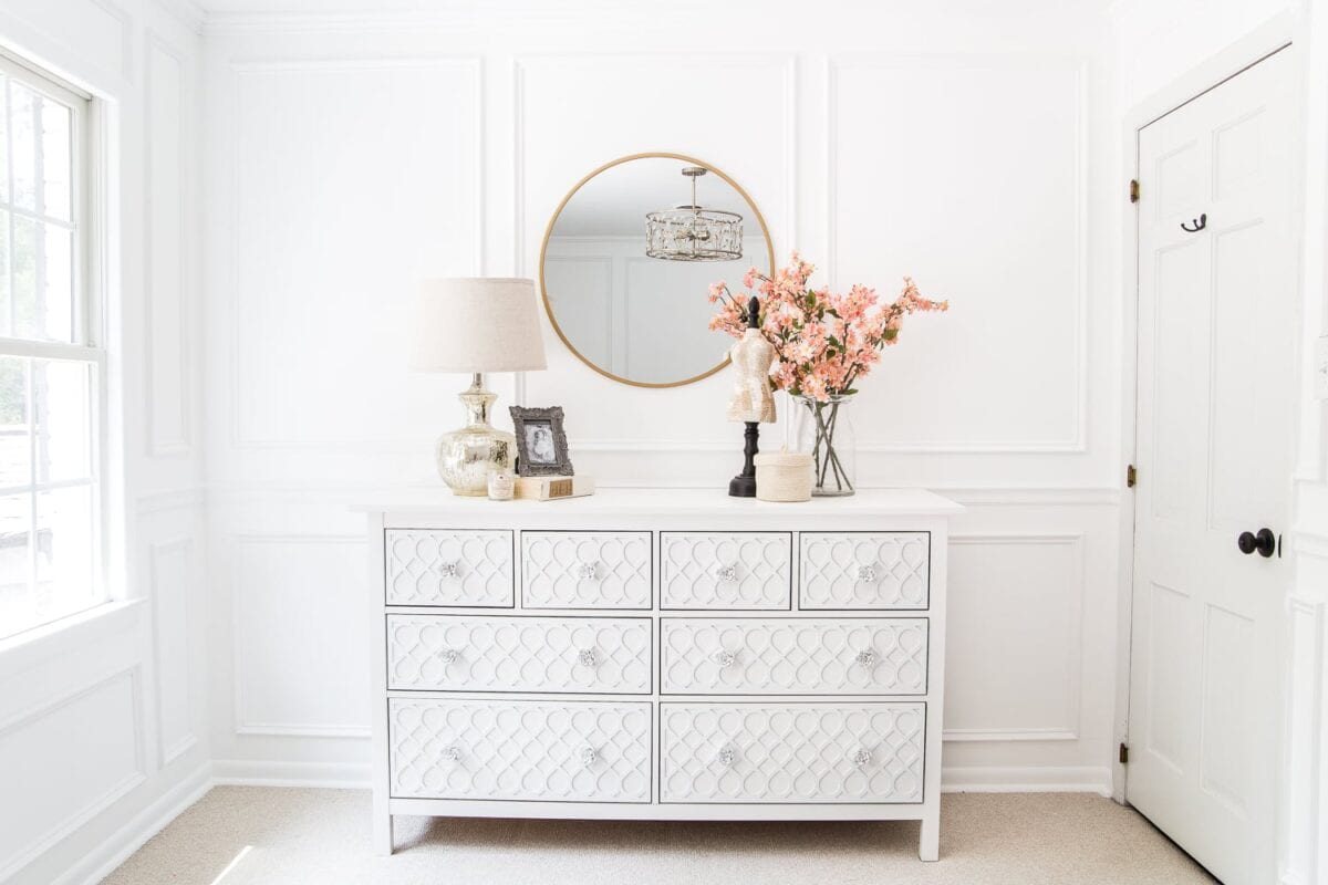 How to get a high-end carved detail look for less on a plain IKEA dresser using appliques. #IKEAhack #dresser #furnituremakeover