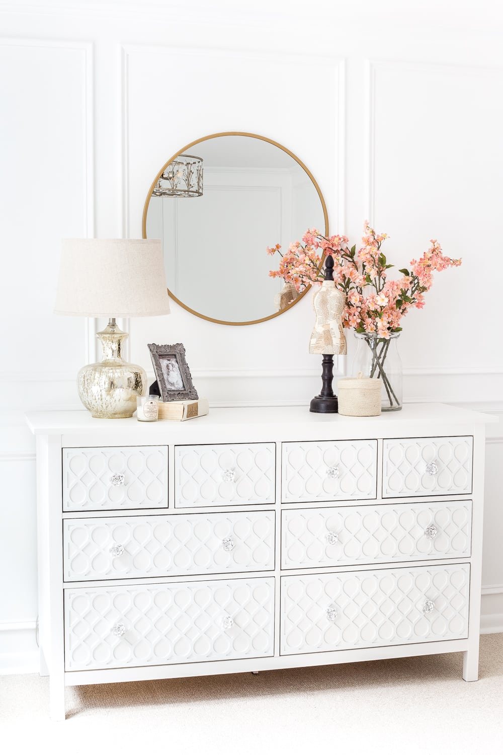 How to get a high-end carved detail look for less on a plain IKEA Hemnes dresser using appliques.