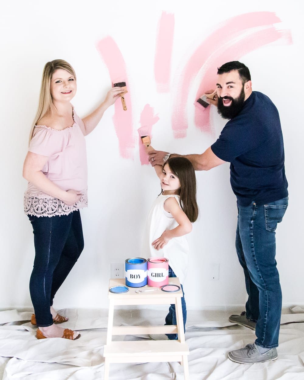 A gender reveal photo shoot using wall paint for the nursery. #genderreveal #heorshe #boyorgirl #nursery #genderphotoshoot #DIYgenderreveal