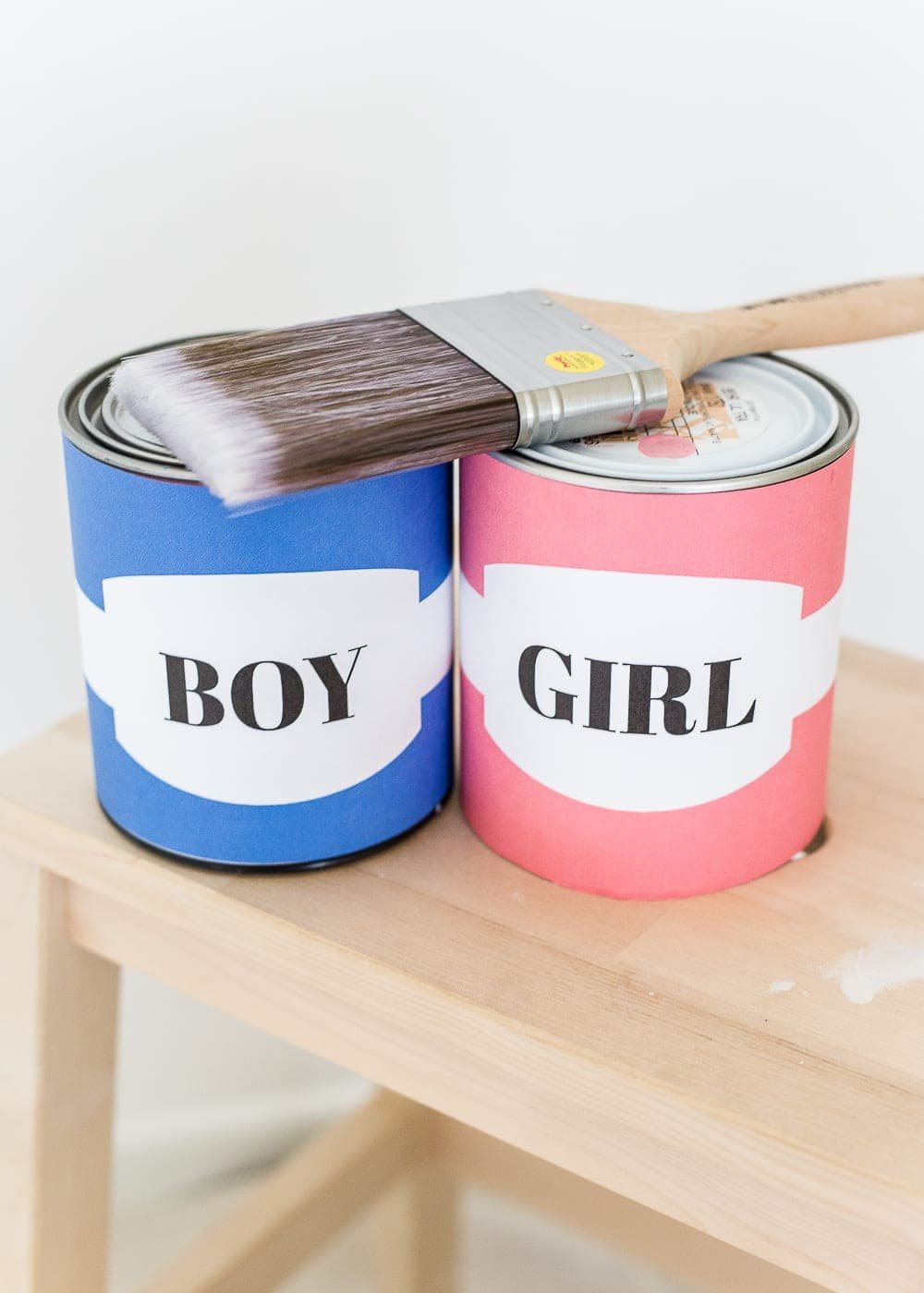 A gender reveal photo shoot using wall paint for the nursery. #genderreveal #heorshe #boyorgirl #nursery #genderphotoshoot #DIYgenderreveal