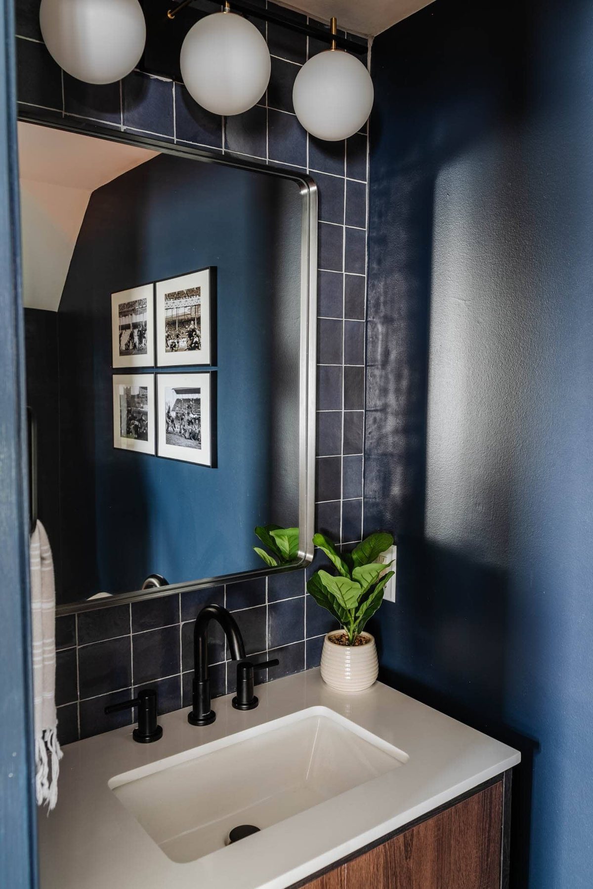 using stacked tile on a wall for a modern style focal point behing a vanity