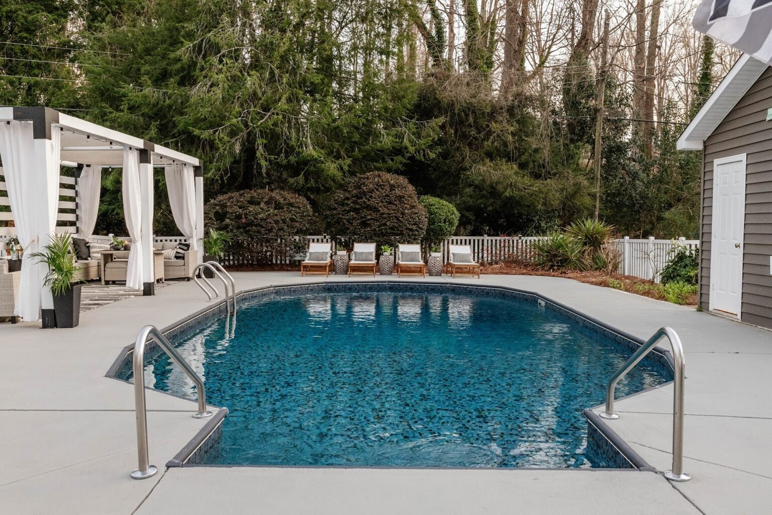 painted concrete patio and pool deck after spring cleaning 3 years after painting