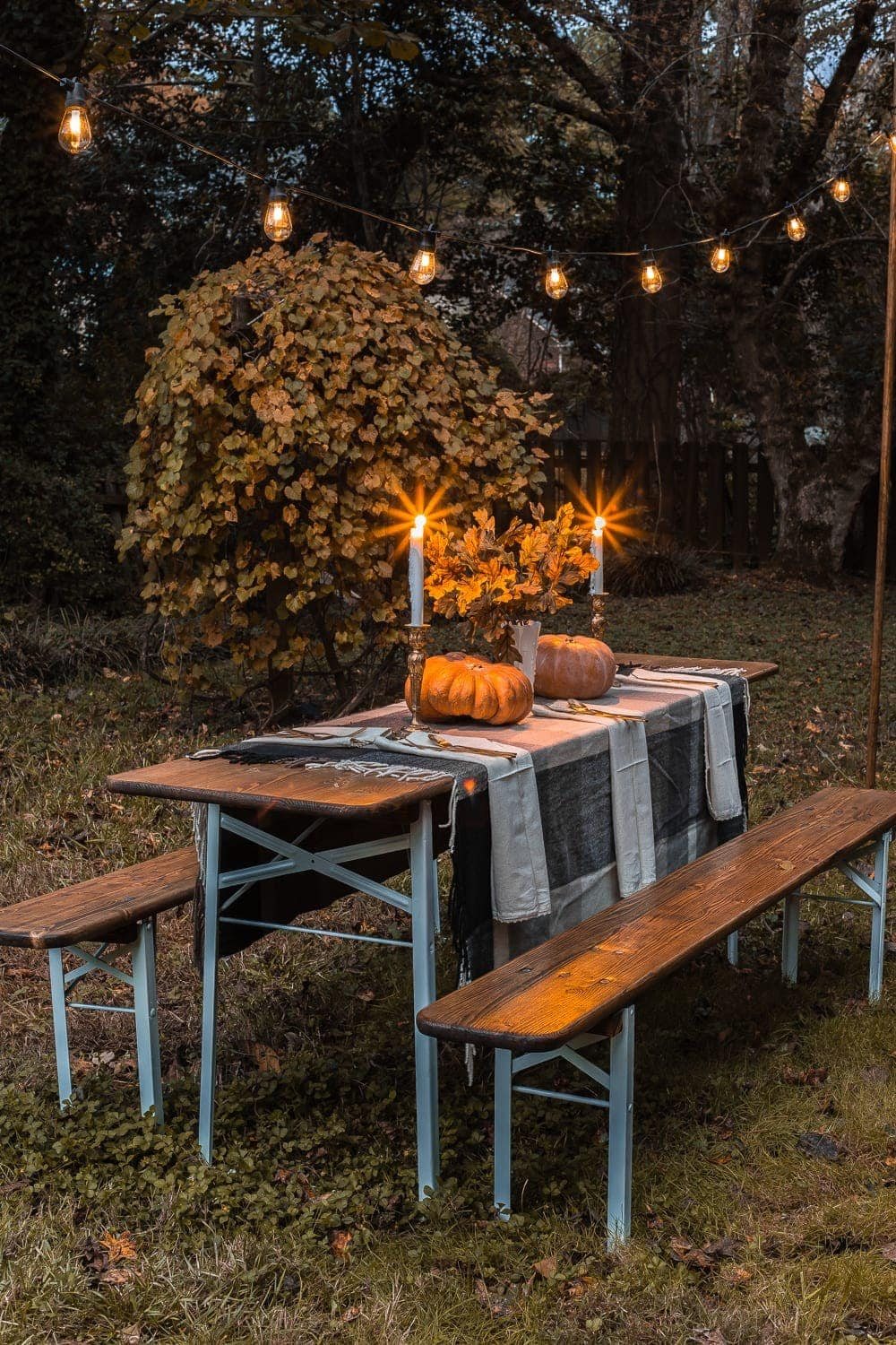 Beer garden table with string lights for fall