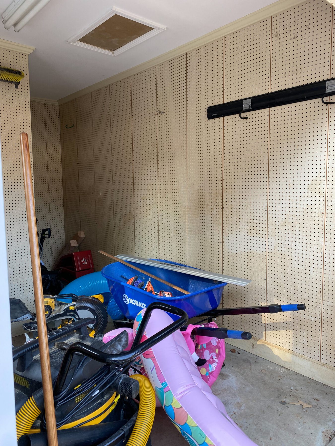 shed interior before with pegboard
