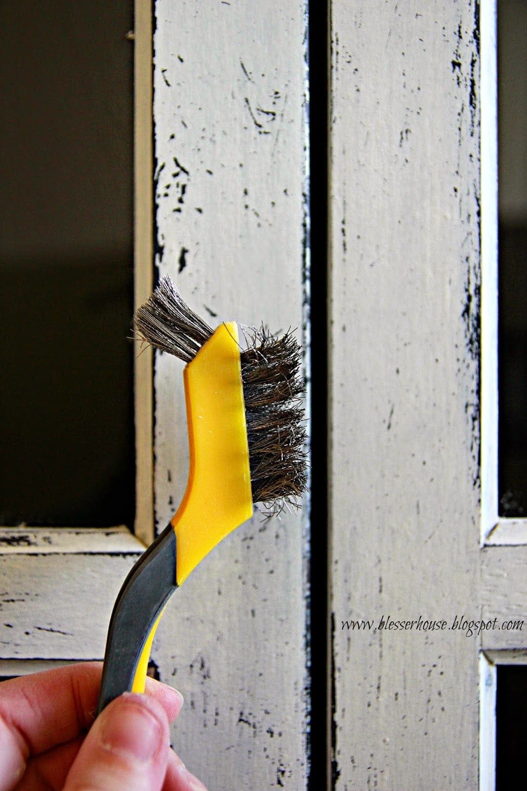how to get a chippy distressed look on painted furniture using a wire brush