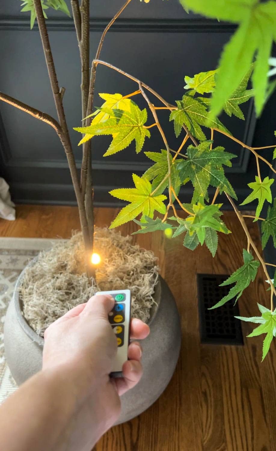 adding an uplight to a fake tree with a remote