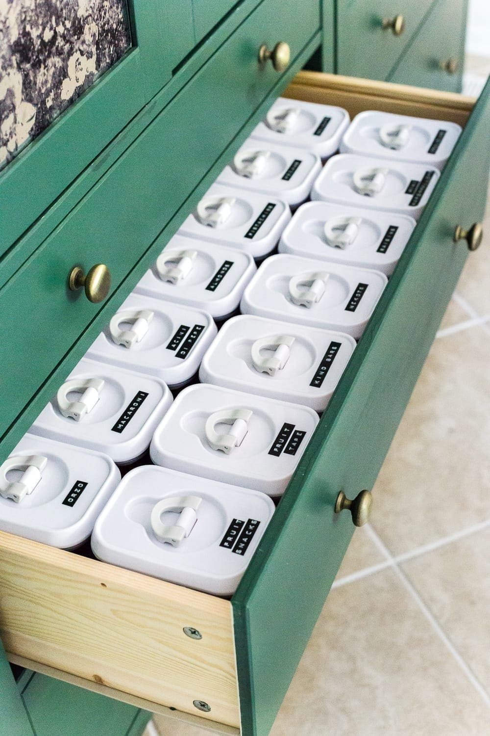 IKEA Hemnes Pantry Cabinet Organization - Tips and ideas for maximizing storage and creating function for food storage in a cabinet to repurpose as a pantry. #pantryorganization