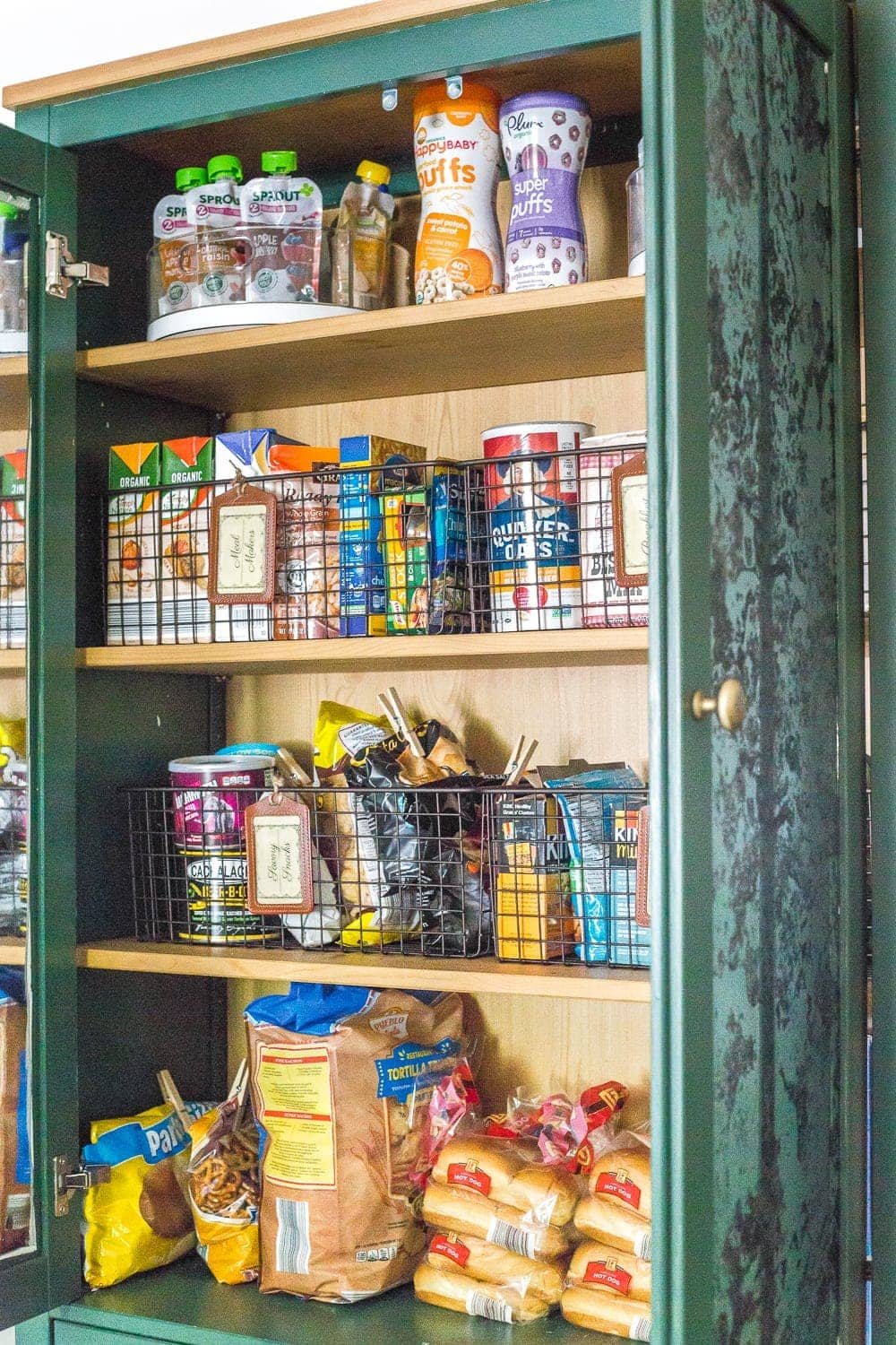 IKEA Hemnes Pantry Cabinet Organization - Tips and ideas for maximizing storage and creating function for food storage in a cabinet to repurpose as a pantry. #pantryorganization