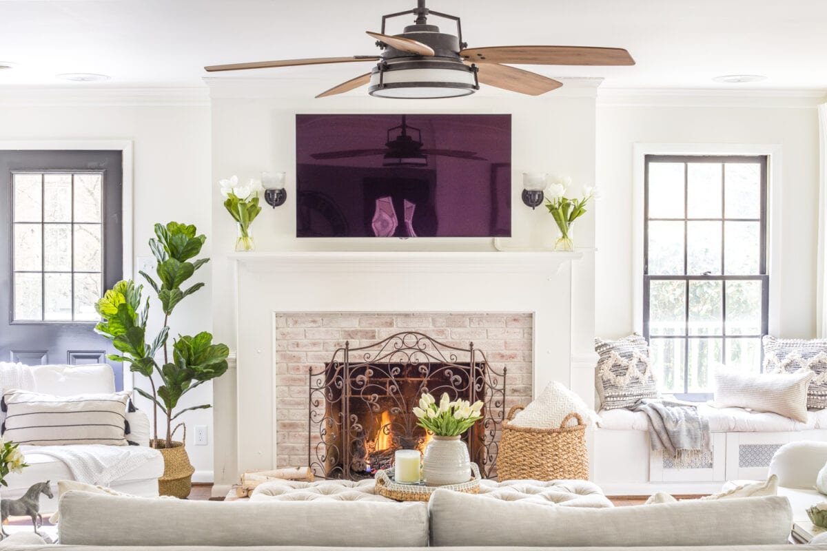 Simple Spring Home Tour | Neutral living room decorated with small floral touches for spring